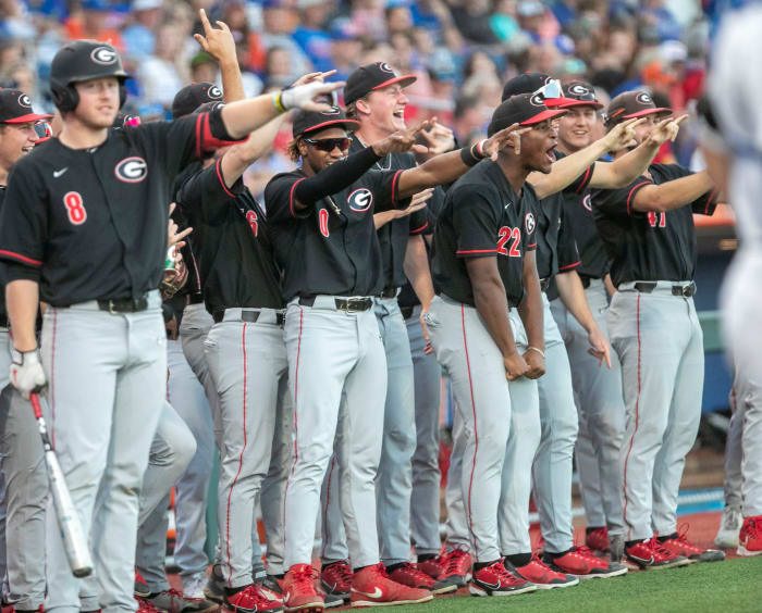 Georgia's dugout celebrates first baseman Charlie Condon's (24) home run on the Gators, Friday, April 14, 2023, at Condron Family Baseball Park in Gainesville, Florida. The Gators lost Game 1 of the weekend series to the Bulldogs 13-11. 2023 Gator Baseball April 14, 2023 Condron Family Ballpark Georgia Bulldogs. (Cyndi Chambers / USA TODAY NETWORK).